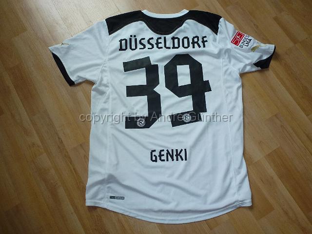 P1200799.JPG - 2012-13 Stadtwerke  #39  Genki Omae   Matchworn  Wintercup  2013  Rückseite